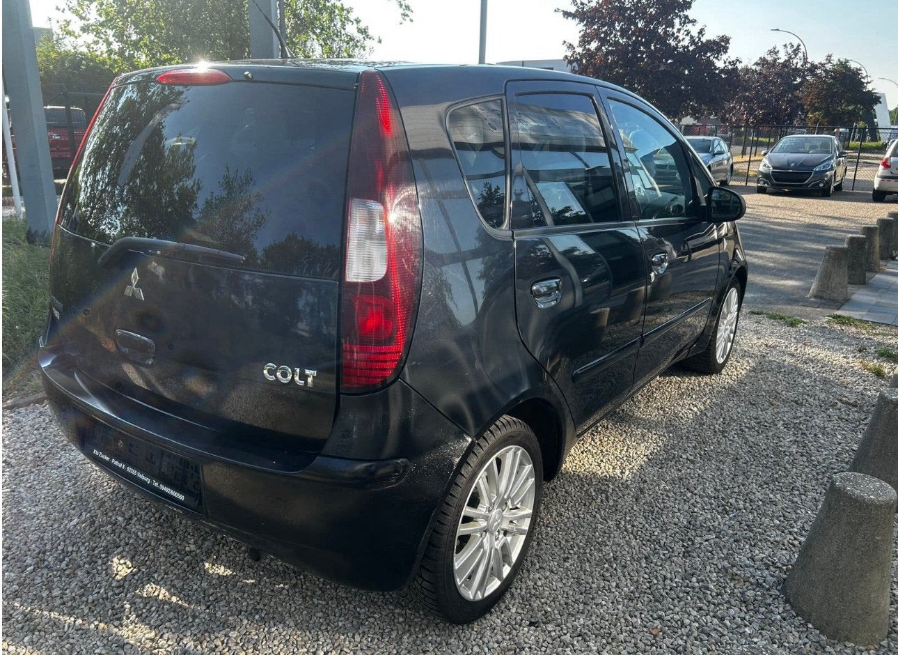 Mitsubitchi colt benzine met keuring verkoop en garantie, Auto's, Voorwielaandrijving, Stof, Zwart, 4 cilinders