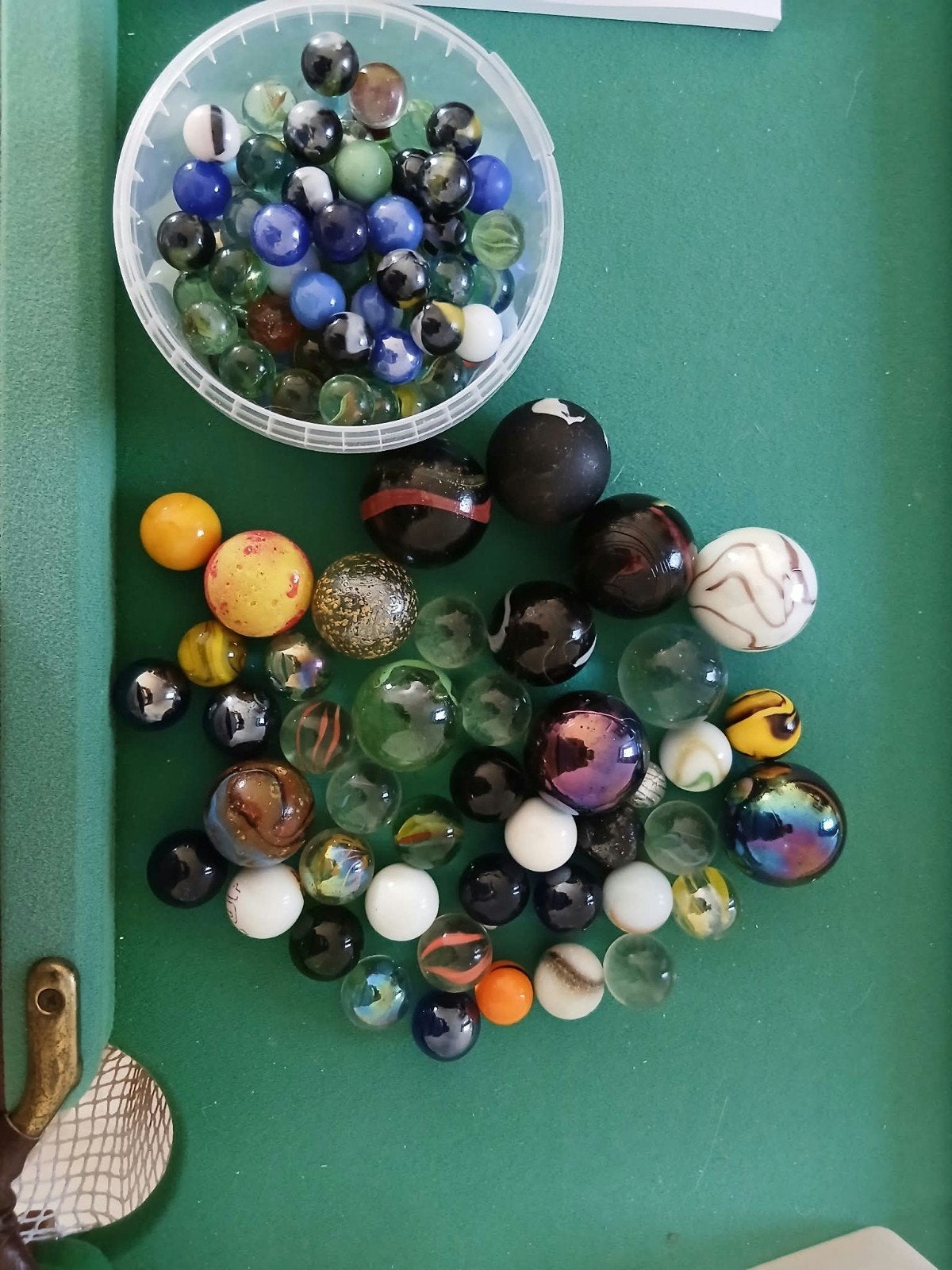 Assortiment knikkers, Ophalen