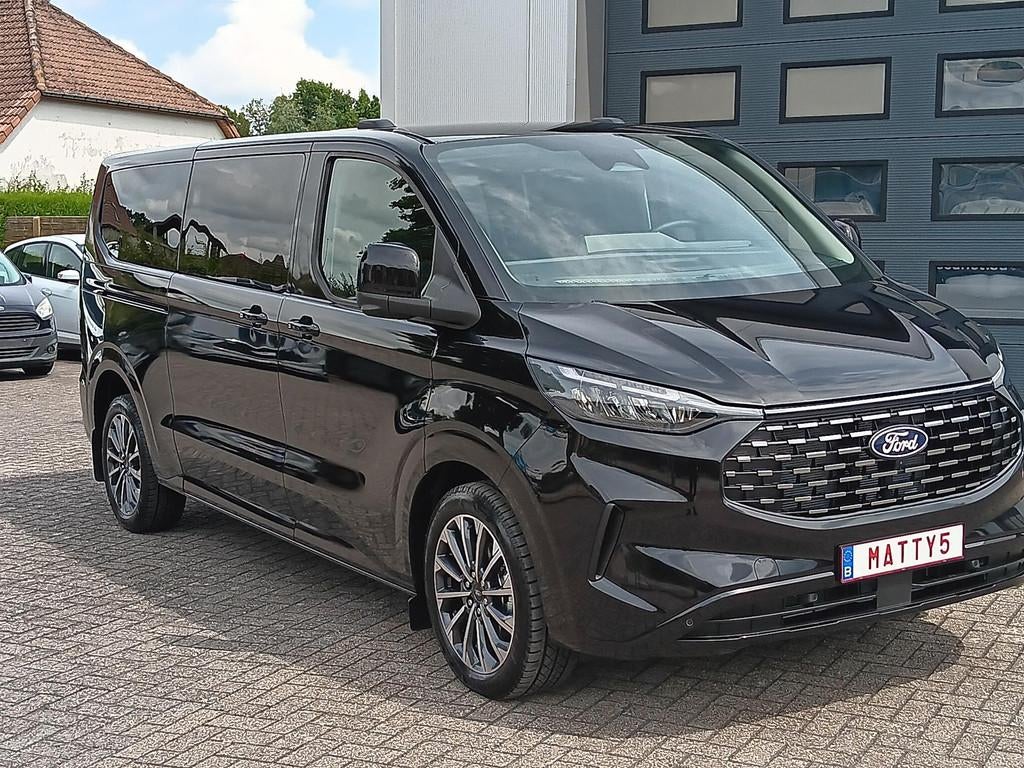 Ford Tourneo Custom Titanium PHEV 227pk LUXE PANO DAK, elek, Auto's, Ford, 4 cilinders, Adaptive Cruise Control, Zwart, Leder