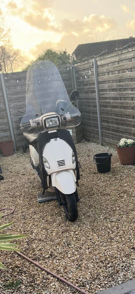 Scooter a klasse, Fietsen en Brommers, Ophalen, Zo goed als nieuw