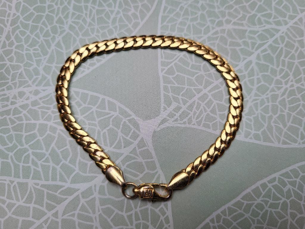 Goud kleurige armband, Handtassen en Accessoires, Armbanden, Ophalen of Verzenden, Nieuw, Goud, Overige materialen