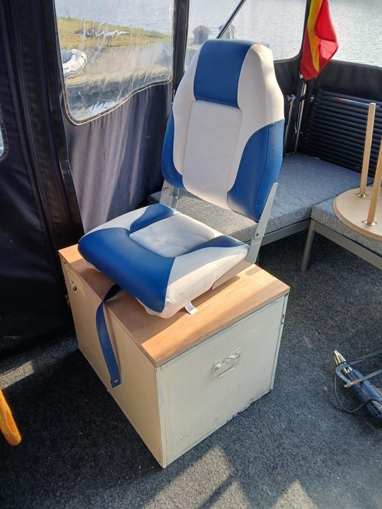 Nieuwe stuurstoel met opbergkist, Ophalen