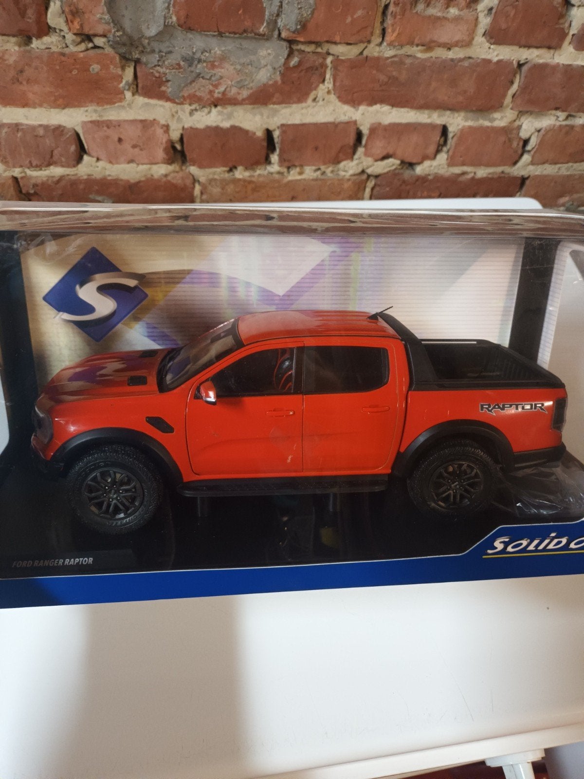 Ford Raptor Ranger, échelle 1,18, état neuf dans sa peinture, Enlèvement ou Envoi