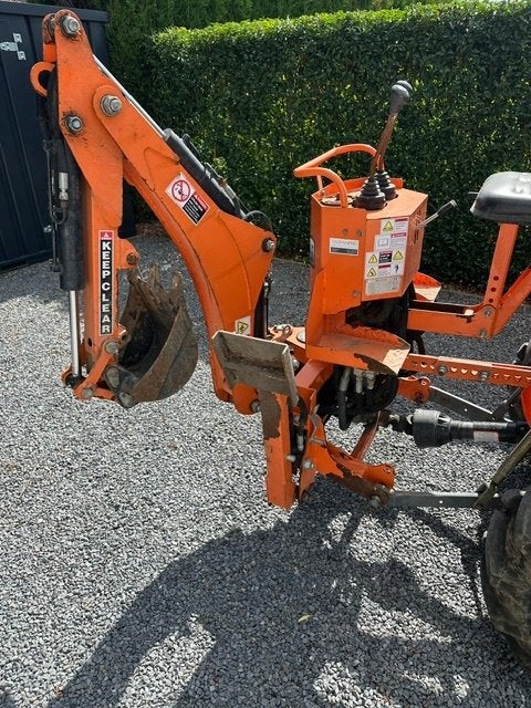 Kraantje backhoe voor achter tractor, Ophalen