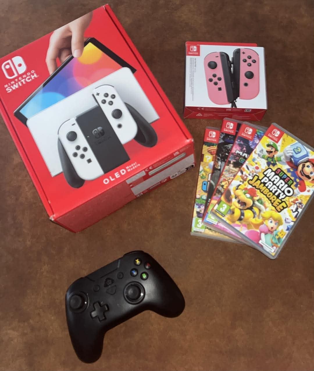 Nintendo switch oled met alle accesoires en 4 games, Ophalen, Zo goed als nieuw, Switch OLED