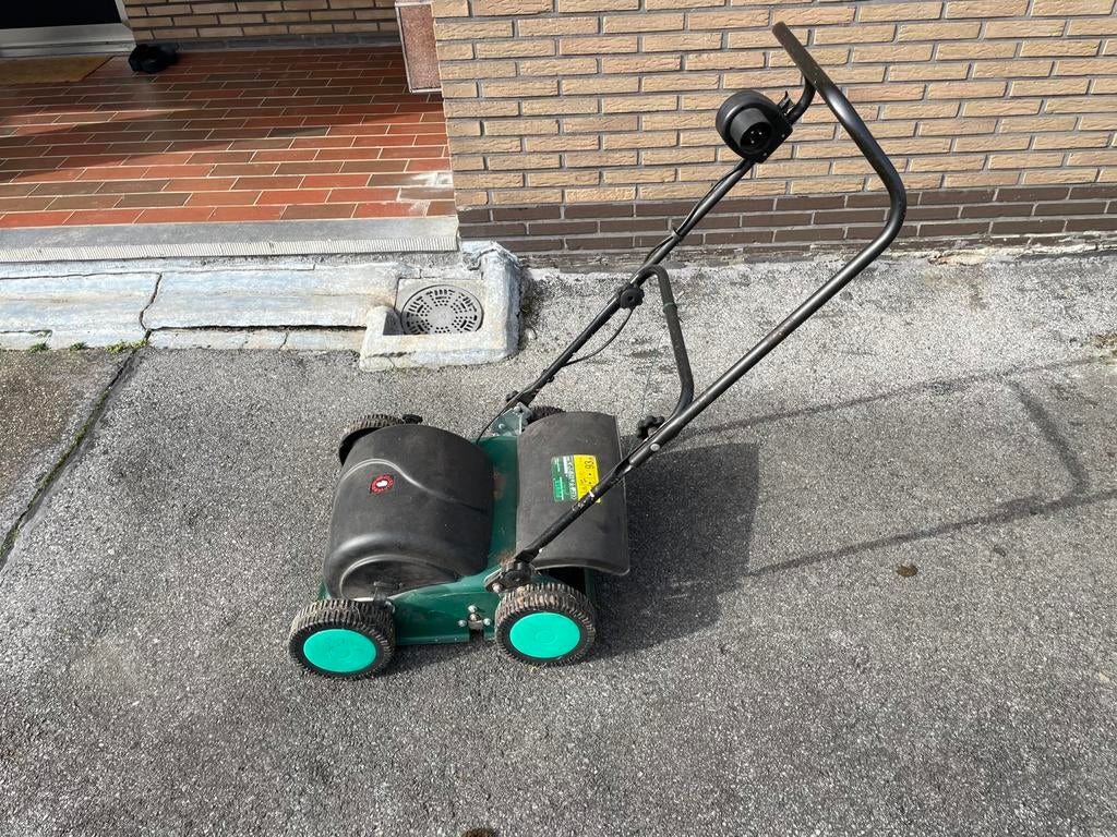 Grasverticuteerder, Ophalen, Gebruikt, Benzine-grasmaaier