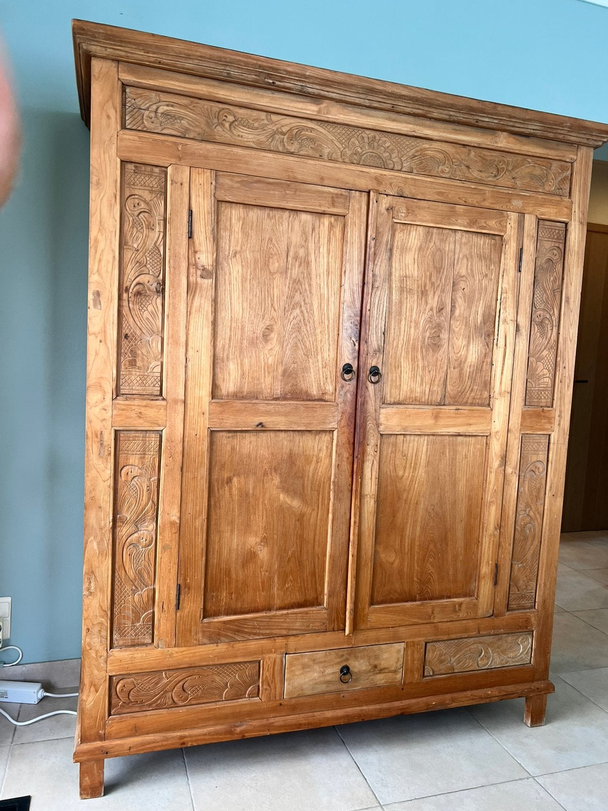 Kast in oude teak, Ophalen