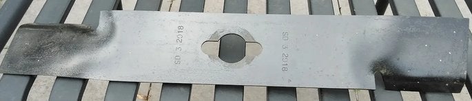 mes voor grasmachine, Ophalen