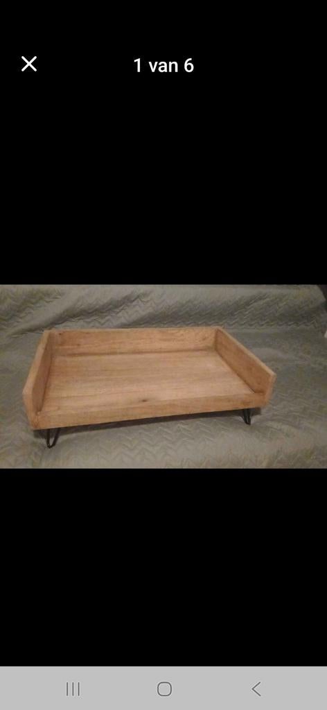 Houten hondenmand, Ophalen