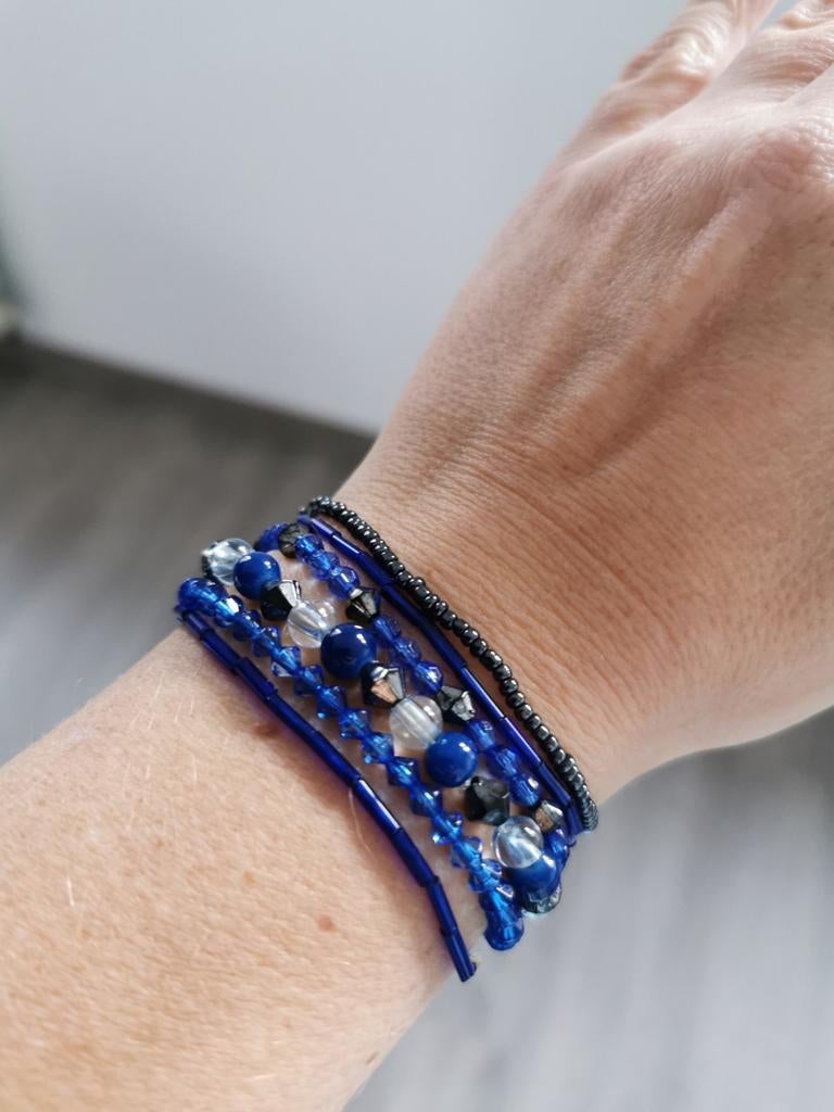 Armbanden set blauw, Handtassen en Accessoires, Armbanden, Ophalen of Verzenden, Gebruikt, Blauw, Kunststof of Plastic