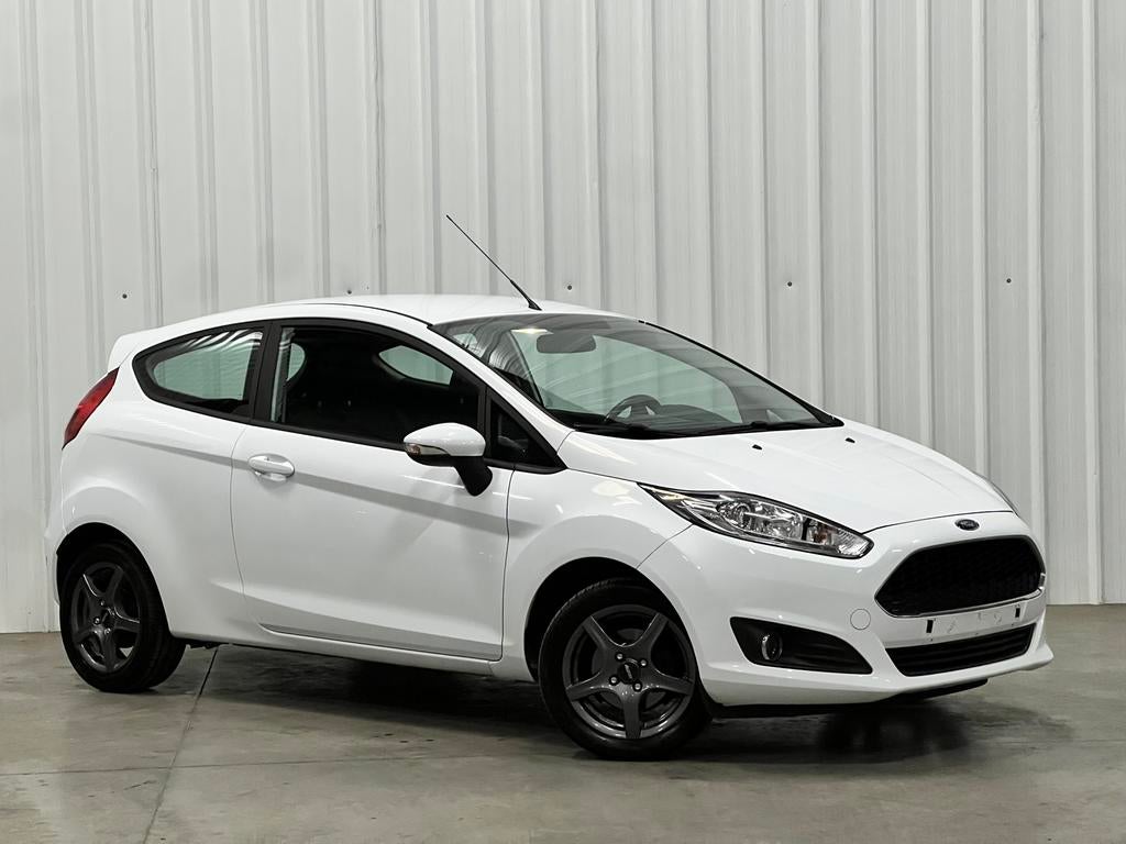- Ford Fiesta - 1.25 Benzine - BJ 07/2016 - 130.000km - PDC, Voorwielaandrijving, Stof, 4 cilinders, Wit