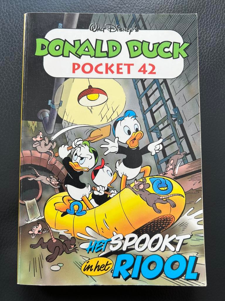 Donald Duck Pocket - 42 - Het spookt in het riool, Une BD, Enlèvement ou Envoi, Comme neuf