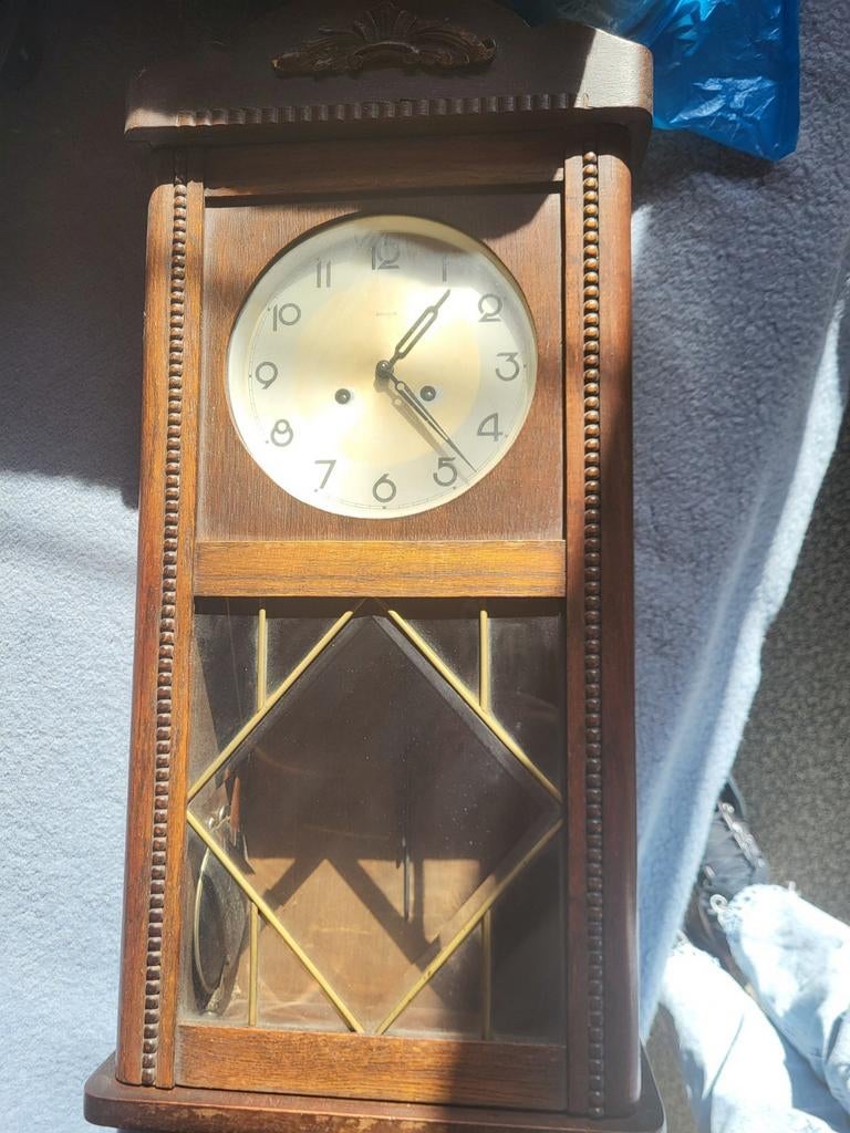 Antieke klok kienzle, Ophalen