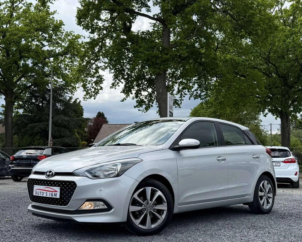 Hyundai i20 1.2i Benzine 2016 Airco CruiseC. Lijnass. Garant, Auto's, Stof, Gebruikt, 4 cilinders, 1055 kg