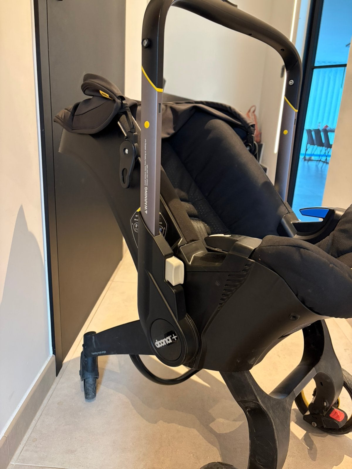 Doona + autostoel & kinderwagen, Ophalen, Zo goed als nieuw, Regenhoes