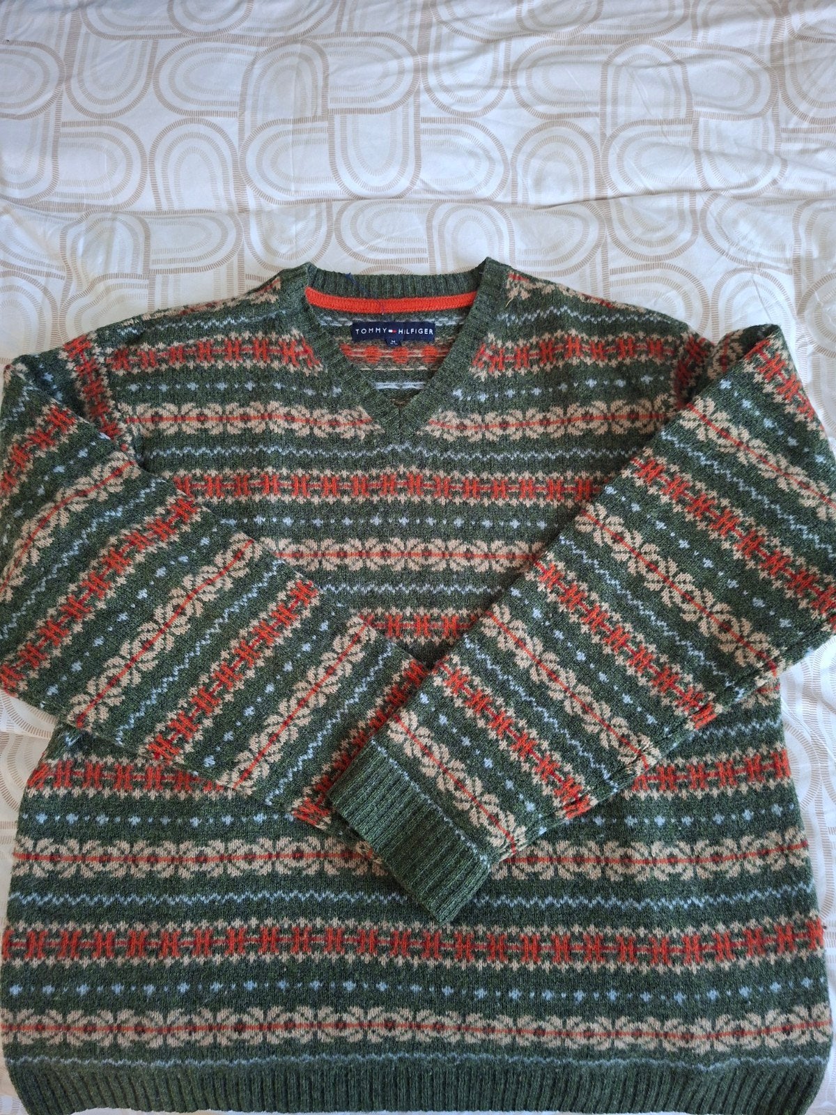 Pull tommy hilfiger, Enlèvement