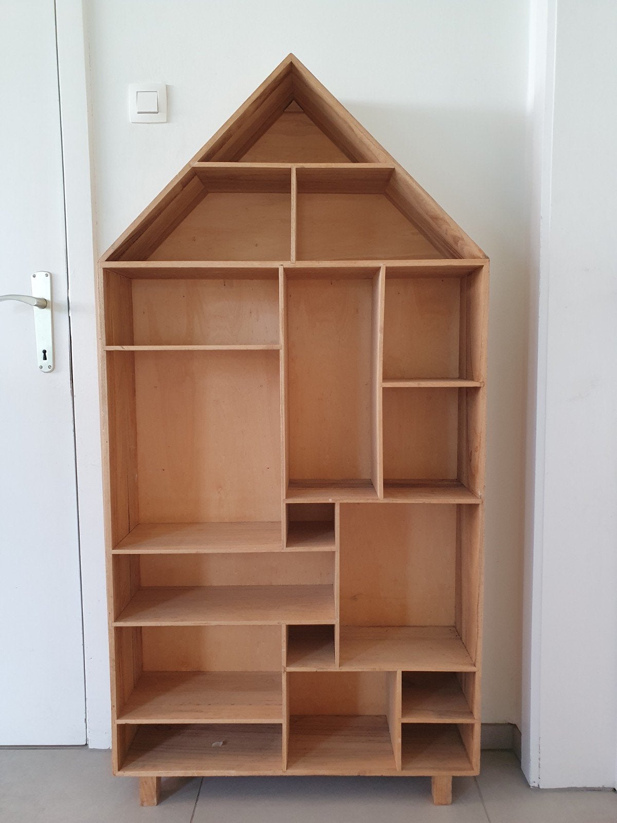 Opberg rek in vorm van huis, Ophalen