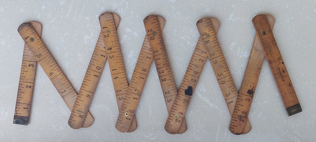 antieke houten vouwmeter, Ophalen