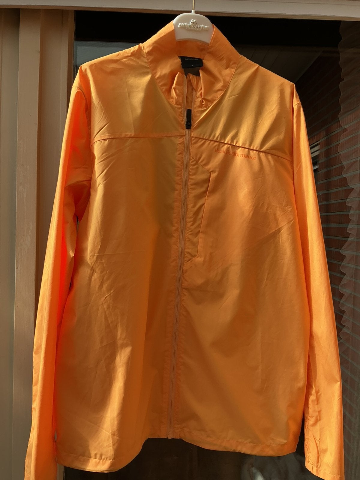 Wind of regenjasje mannen, Ophalen, Zo goed als nieuw