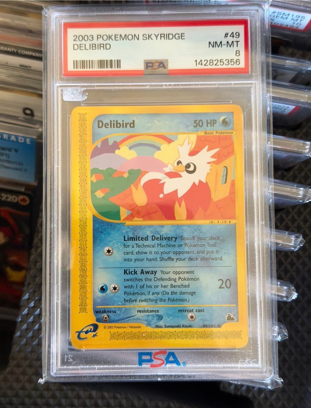 PSA 8 Delibird Skyridge 49/144 2003 Pokémon Graded vintage, Ophalen of Verzenden, Zo goed als nieuw, Losse kaart, Foil