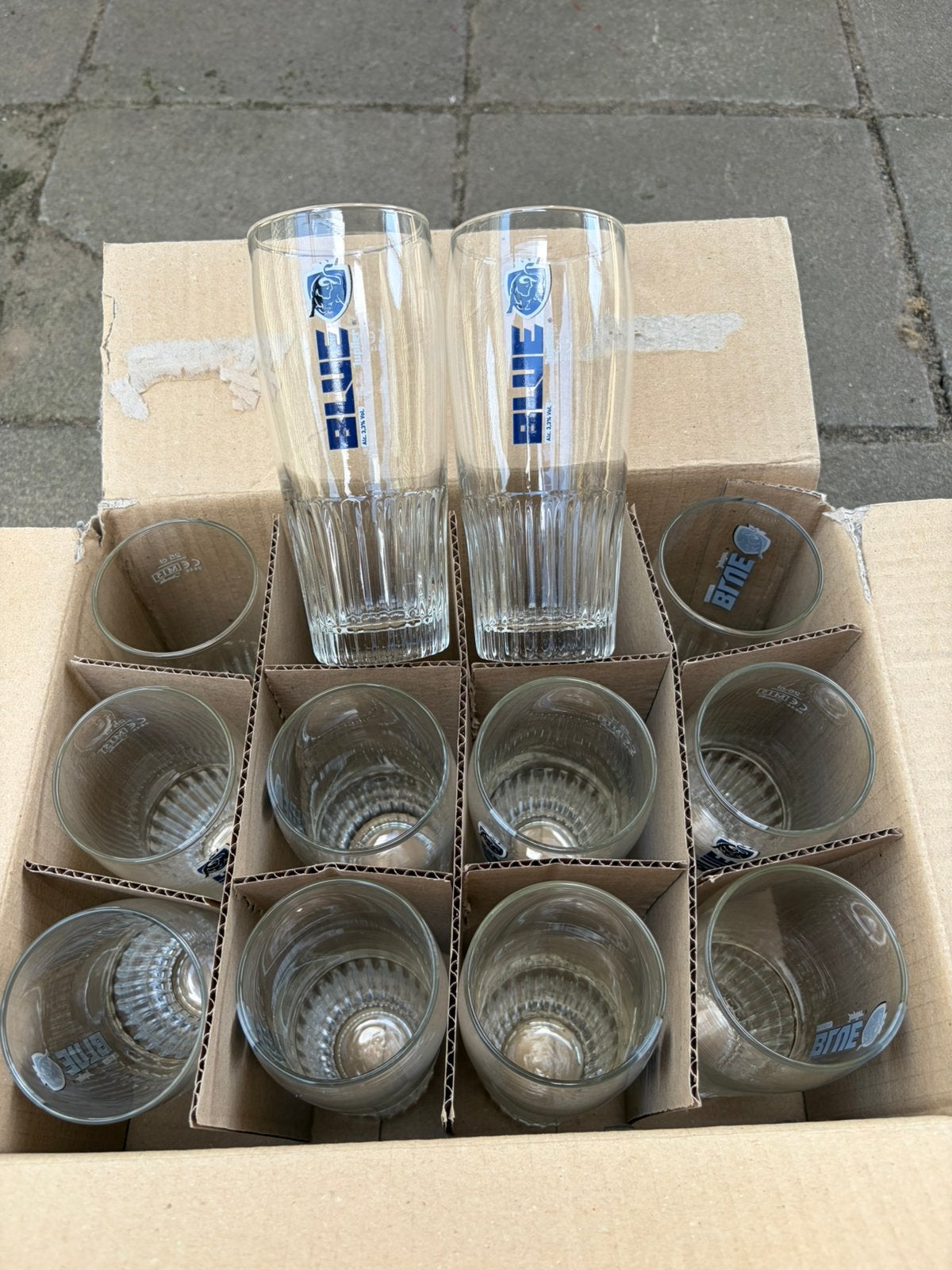 Volle doos Jupiler Blue ribbelglazen, Ophalen, Nieuw