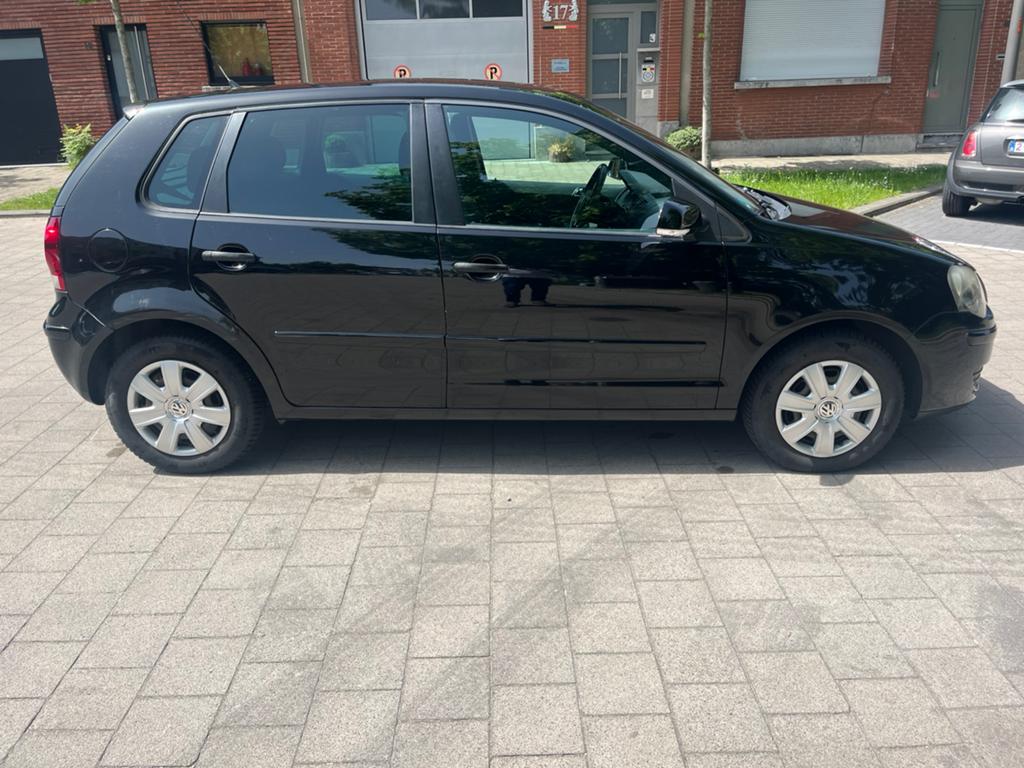 Vw Polo 9n te koop benzine zwart dakhemel en met keuring!, Voorwielaandrijving, 4 deurs, Stof, Zwart