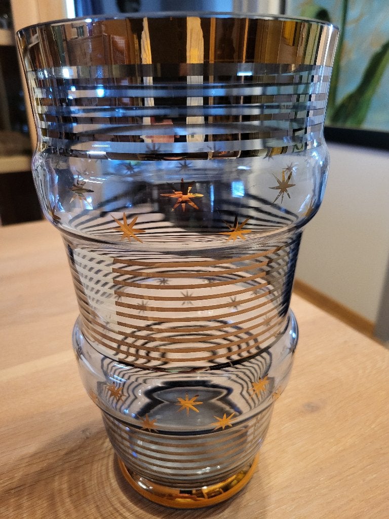 Booms glas vaas met goud, Ophalen