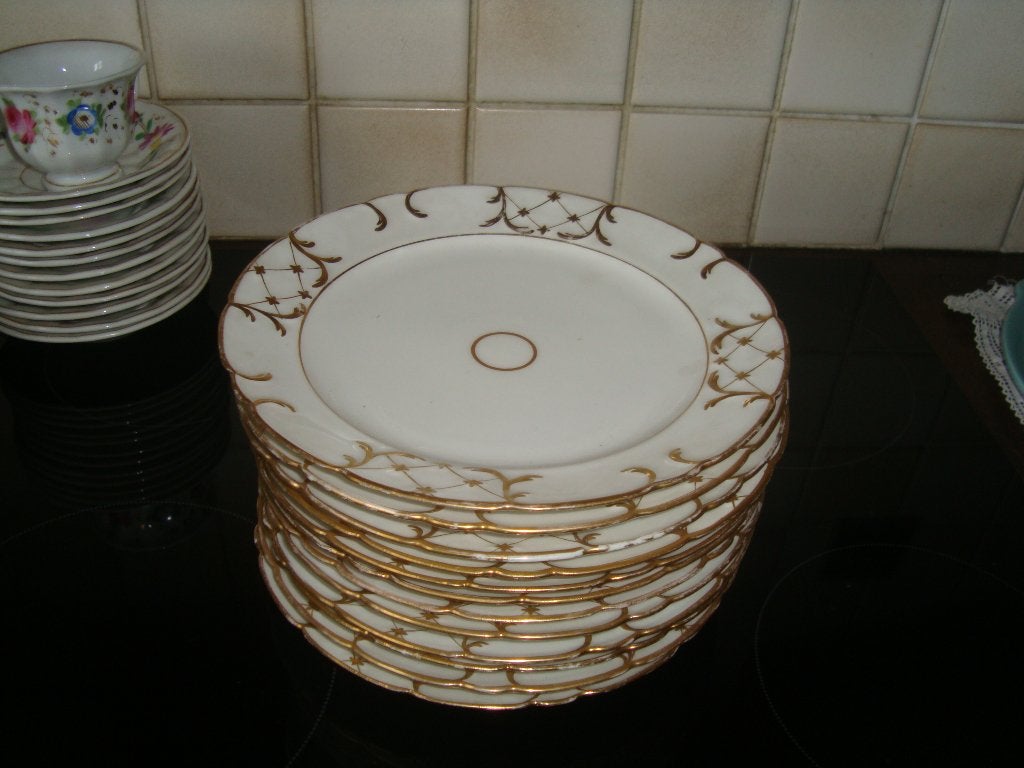 12 Dessertborden on Oud Brussels porselein., Ophalen