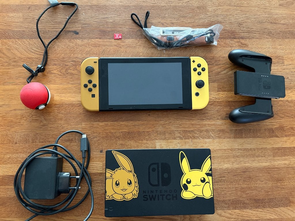 Nintendo Switch - Let's Go Eevee - Limited Edition, Ophalen of Verzenden, Zo goed als nieuw, Met harde schijf, Switch Original