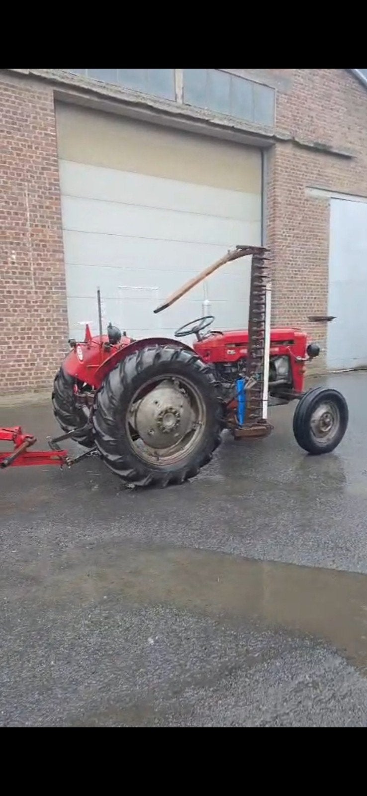 Tractor met maaibalk, massi ferguson, Ophalen
