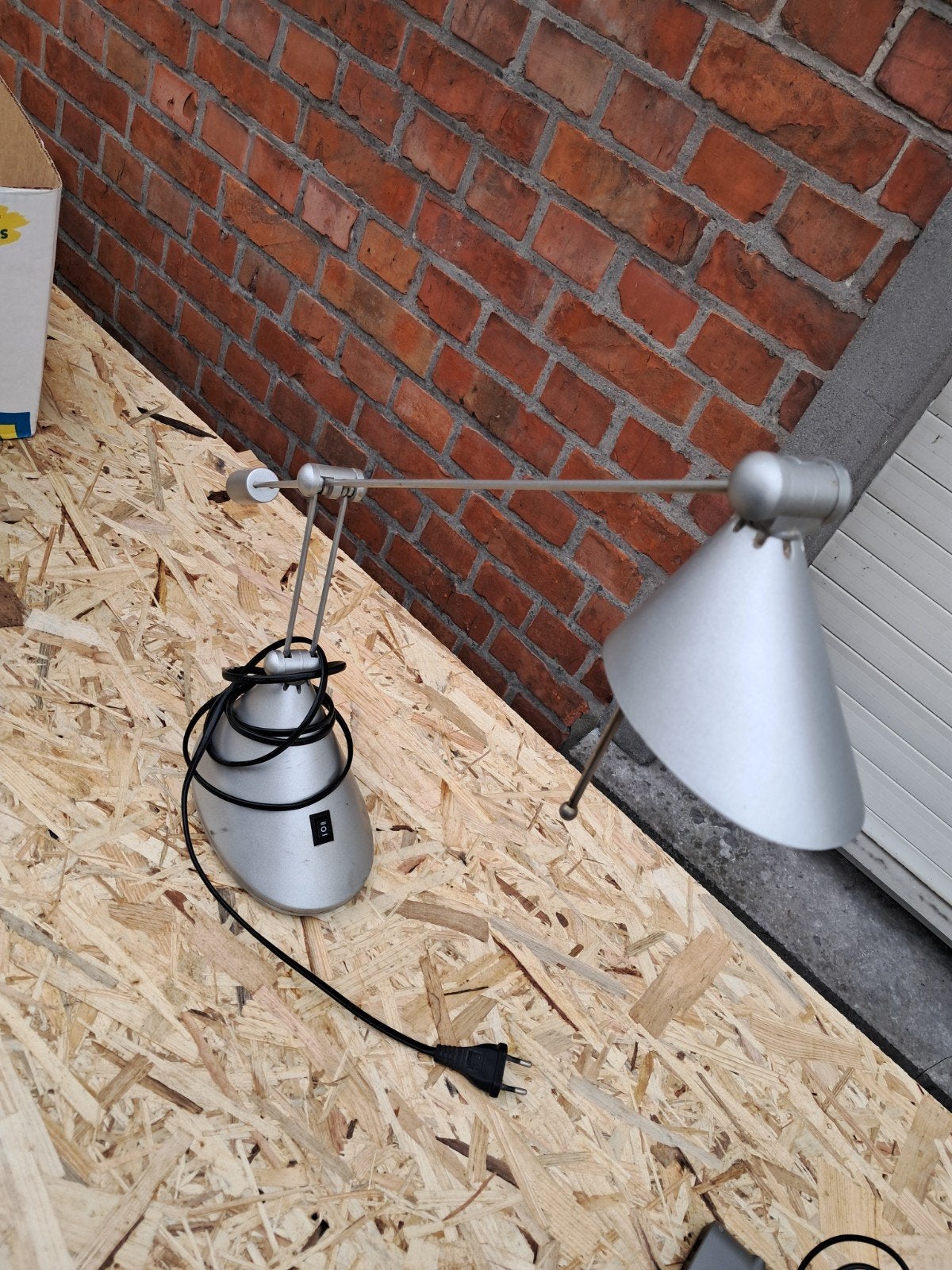 Bureaulamp, Ophalen