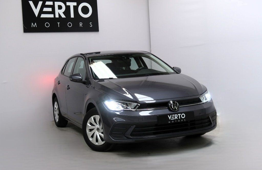 Volkswagen Polo TSI DSG, Auto's, Stof, 5 deurs, 3 cilinders, Zilver of Grijs