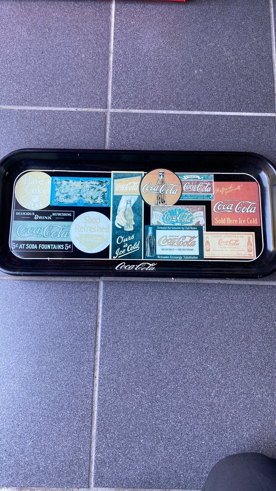 Coca cola metalen bord, Ophalen