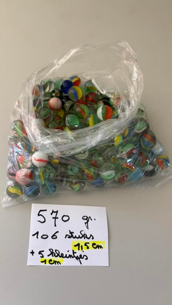 knikkers of marbles, Ophalen, Zo goed als nieuw