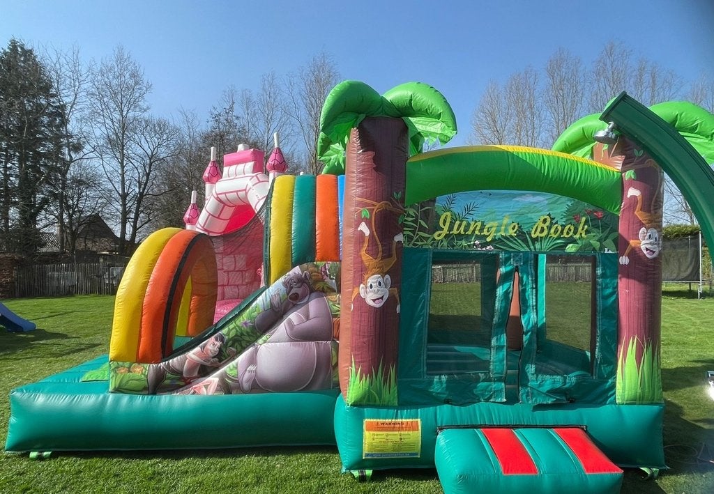 TE HUUR Springkasteel Jungle Book met valnet en glijbaan!, Ophalen, Zo goed als nieuw