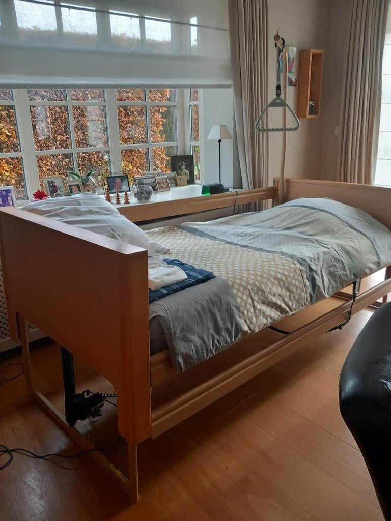 Electisch ziekenhuisbed, Ophalen