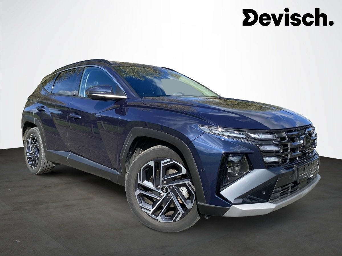Hyundai Tucson HEV 1.6 T-GDi A/T SHINE 215 A6 (bj 2024), Gebruikt, 4 cilinders, Blauw, 5 zetels