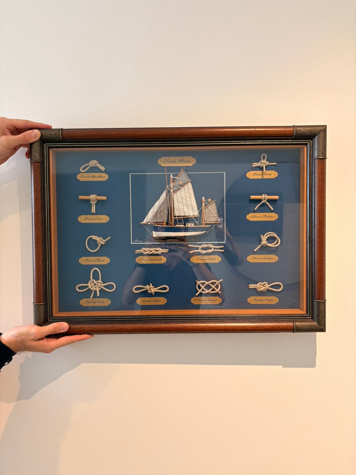 Kleine Zeevaart kader met zeemansknopen, Ophalen