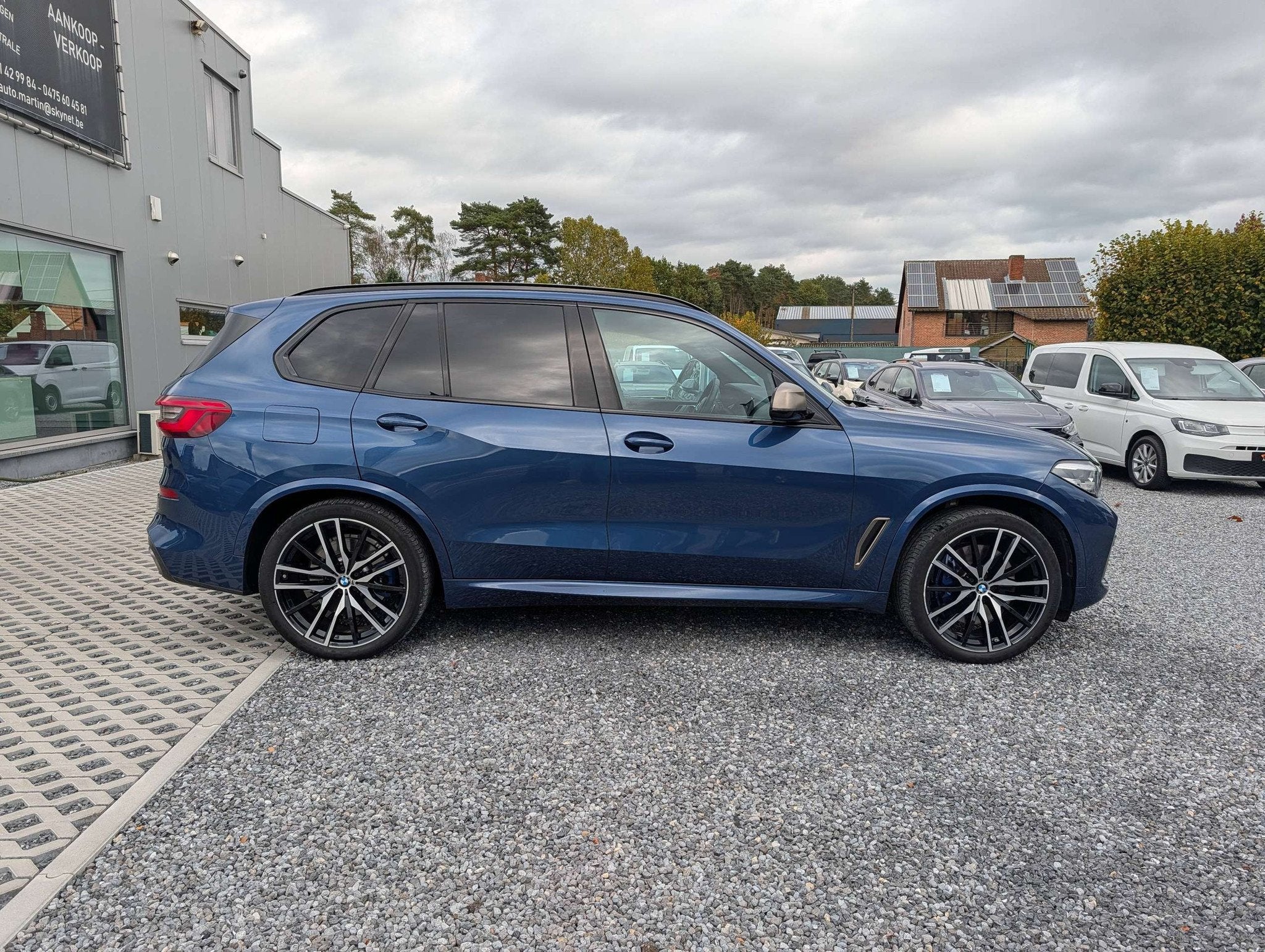 BMW X5 M M50 | AWD | PANO | LICHTE VRACHT | FULL OPTION | AD, Auto's, Automaat, 2993 cc, Blauw, Bedrijf