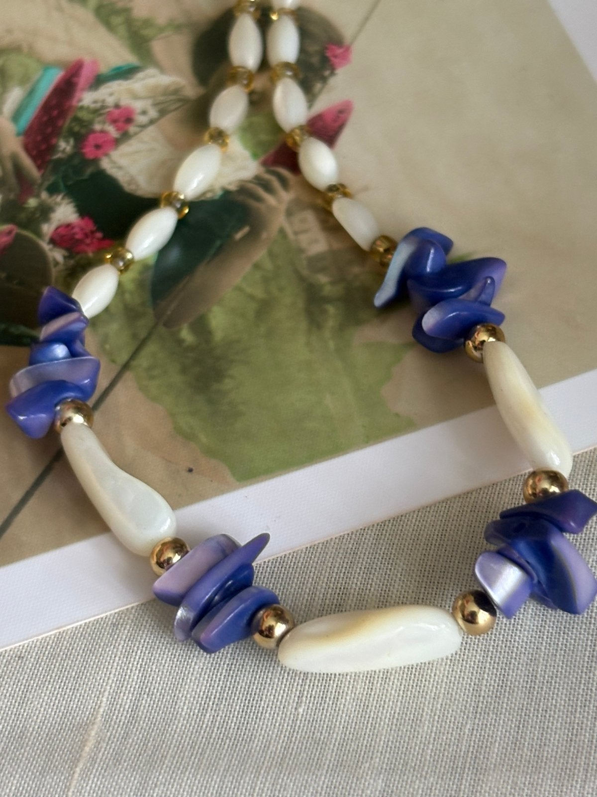 Vintage ketting van natuurlijk parelmoer uit de jaren 80/90, Verzenden, Zo goed als nieuw, Blauw