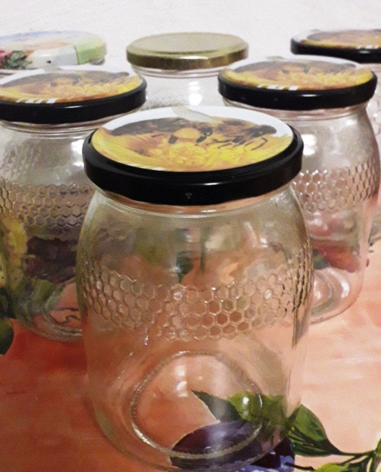9 bocaux ayant contenu ,1 kg de miel...1€ pièce., Enlèvement, Comme neuf, Verre