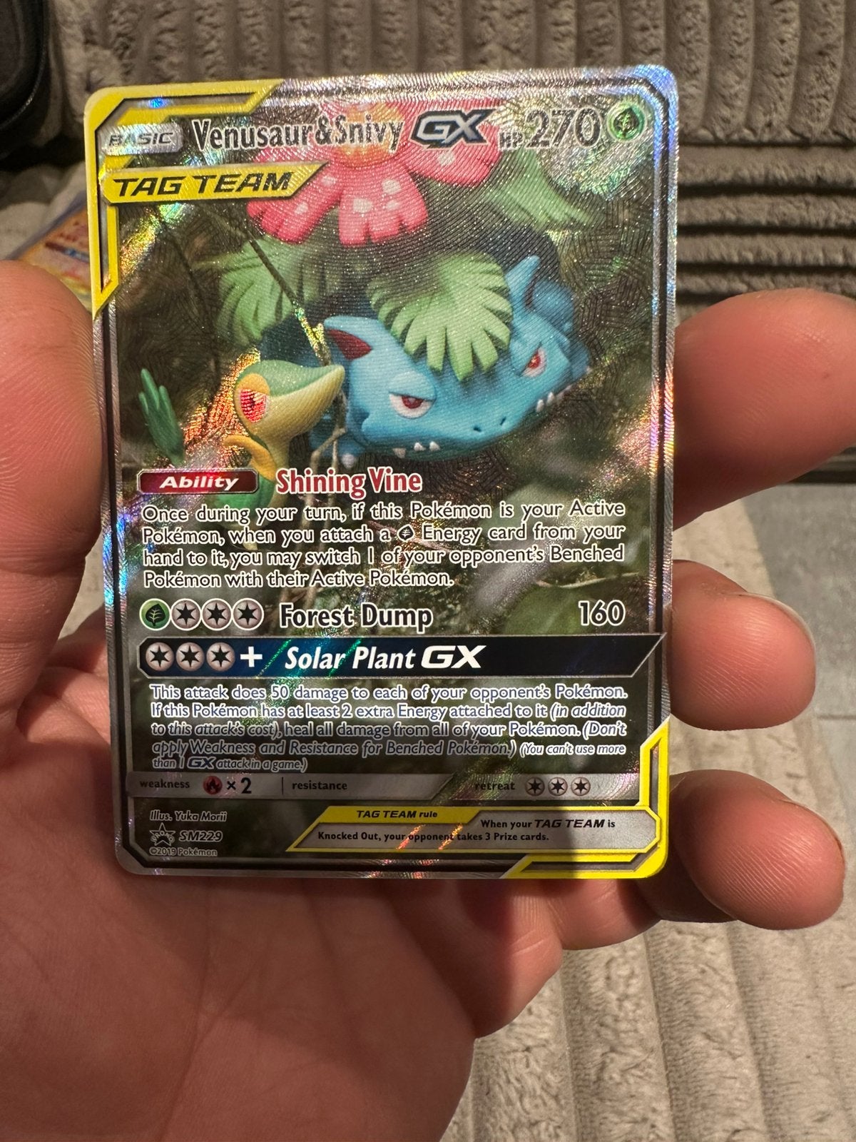 Pokémon Venusaur et Snivy SM229 Black Star Promo’s Tag Team, Enlèvement ou Envoi, Comme neuf, Cartes en vrac