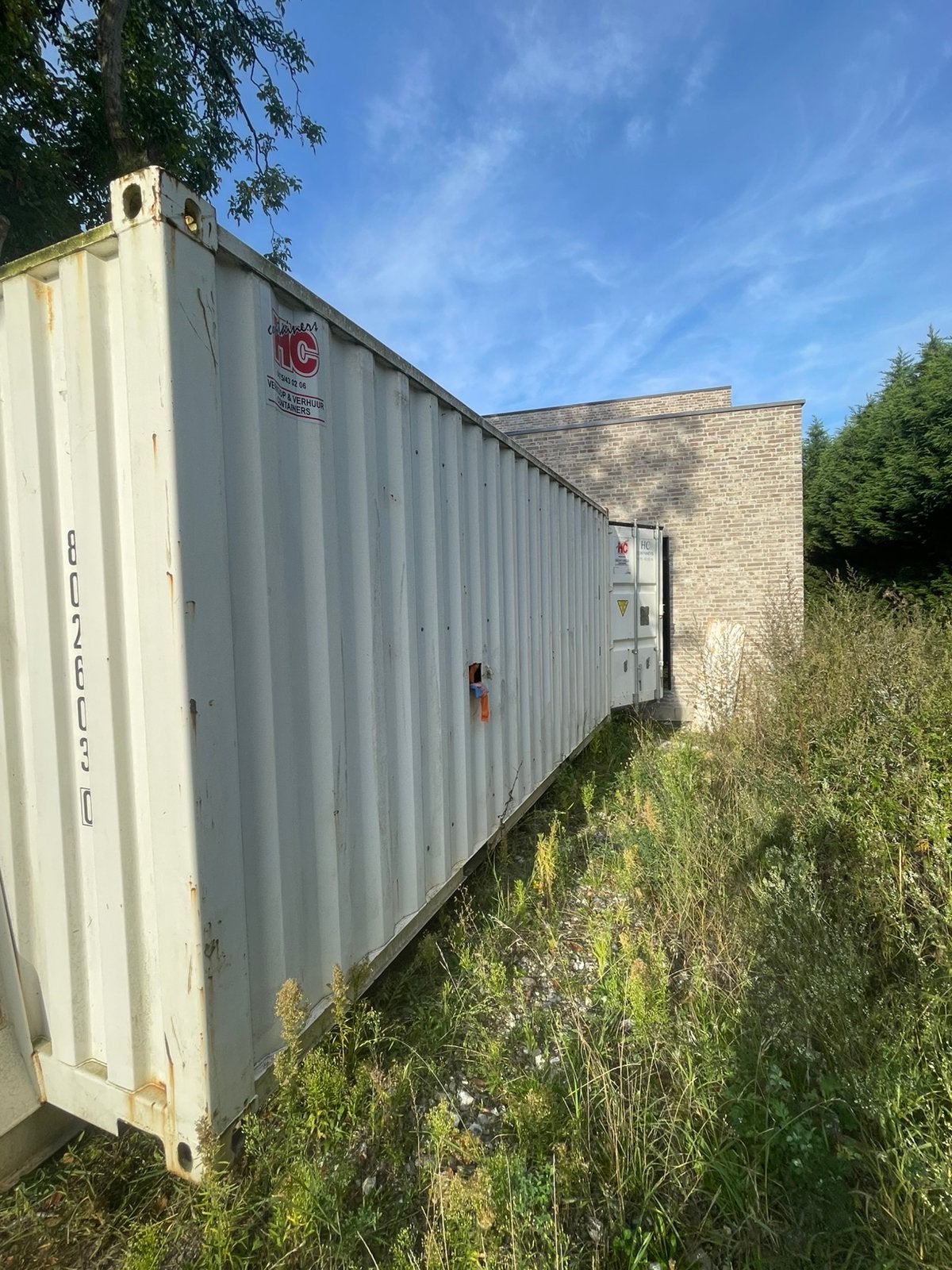 Container ingericht voor pleisterwerken, Ophalen