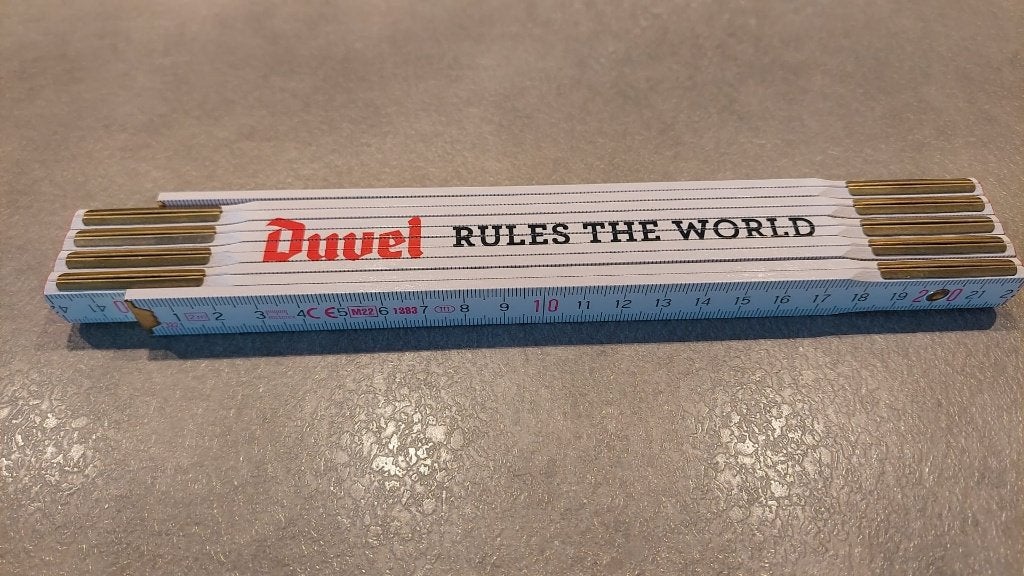 Originele Duvel Vouwmeter (2m) - "Duvel Rules The World", Ophalen, Nieuw, Overige typen, Duvel