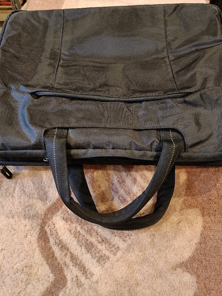 sac ordinateur neuf, Enlèvement