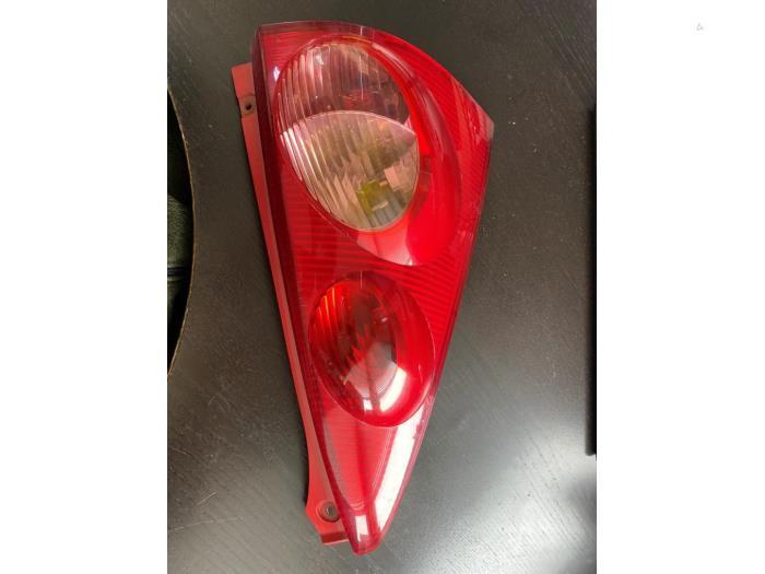 Feu arrière gauche d'un Peugeot 107, -, 3 mois de garantie, Utilisé, -