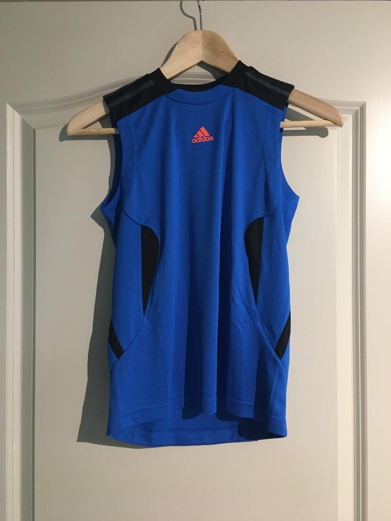 Blauwe T-shirt zonder mouwen adidas 10 jaar, Enfants & Bébés, Vêtements enfant | Taille 140, Enlèvement ou Envoi, Chemise ou À manches longues