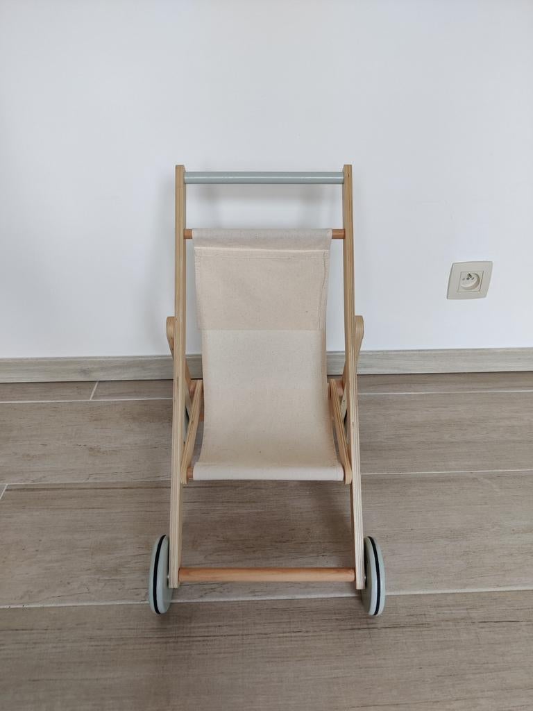 Houten poppenwagen, Ophalen