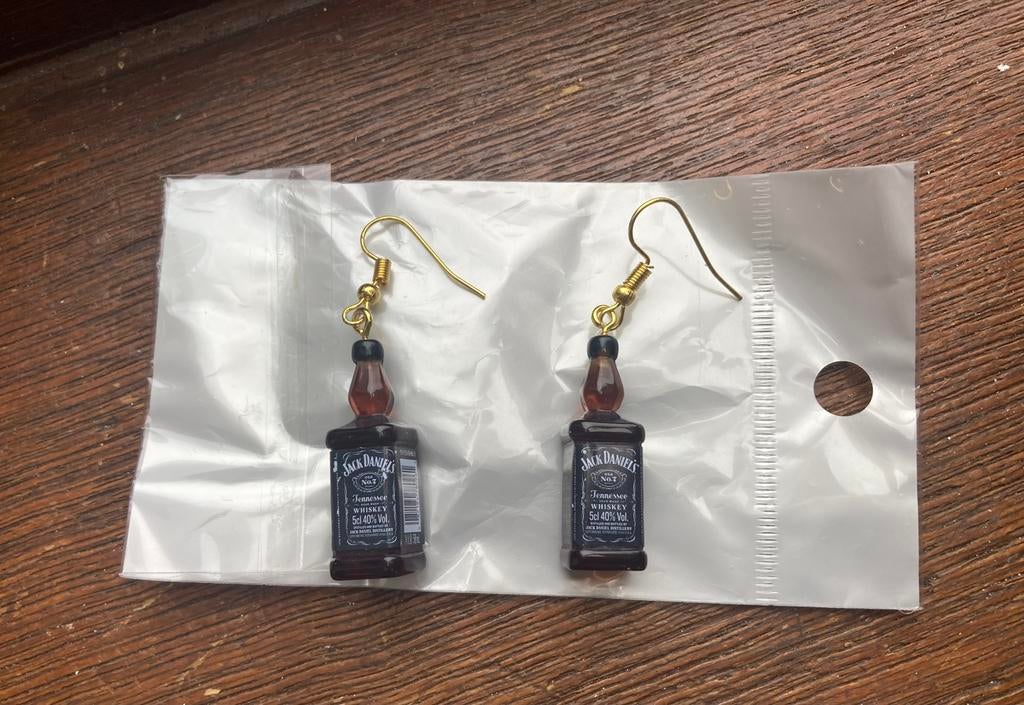 Une paire de boucle d’oreille Jack Daniel neuve, Enlèvement ou Envoi, Neuf