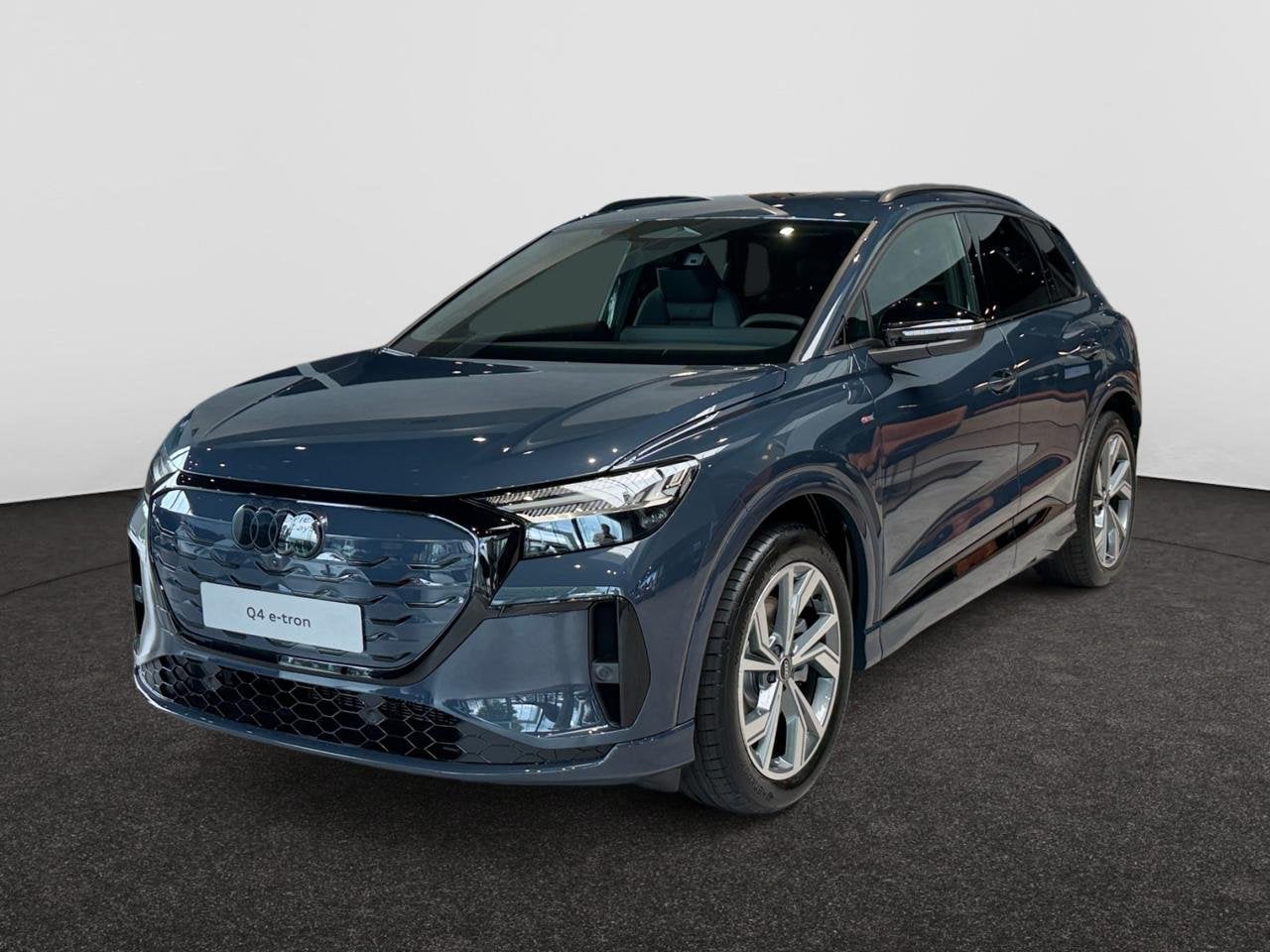 Audi Q4 e-tron 82 kWh Performance Corporate S, Auto's, Automaat, Parkeersensor, Blauw, Elektrisch